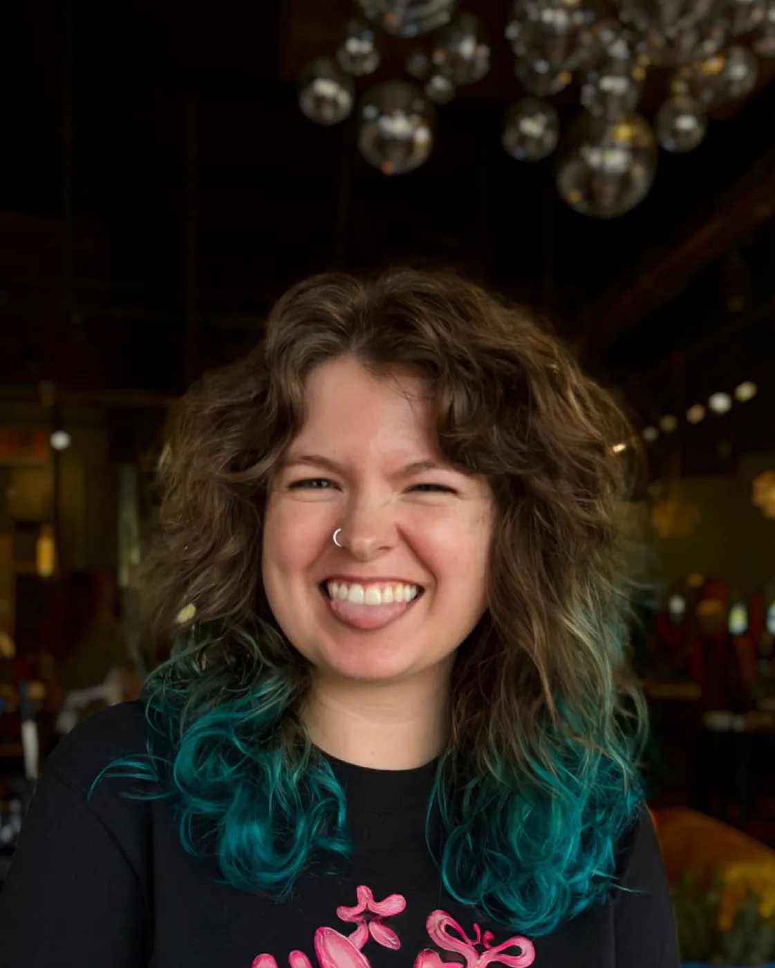 Teal-to-blue ombre on natural curls