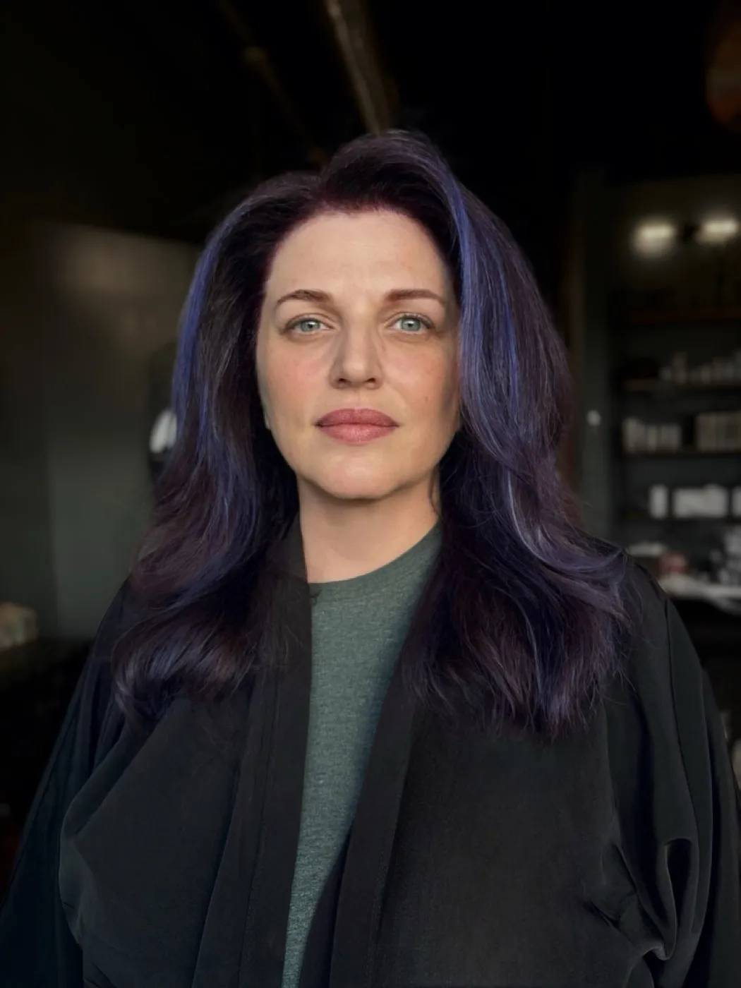 Soft violet money piece on dark hair