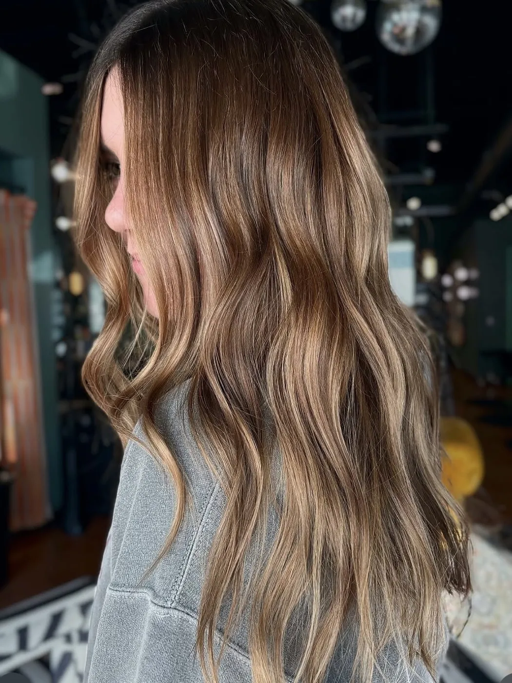 Warm bronde balayage on long waves